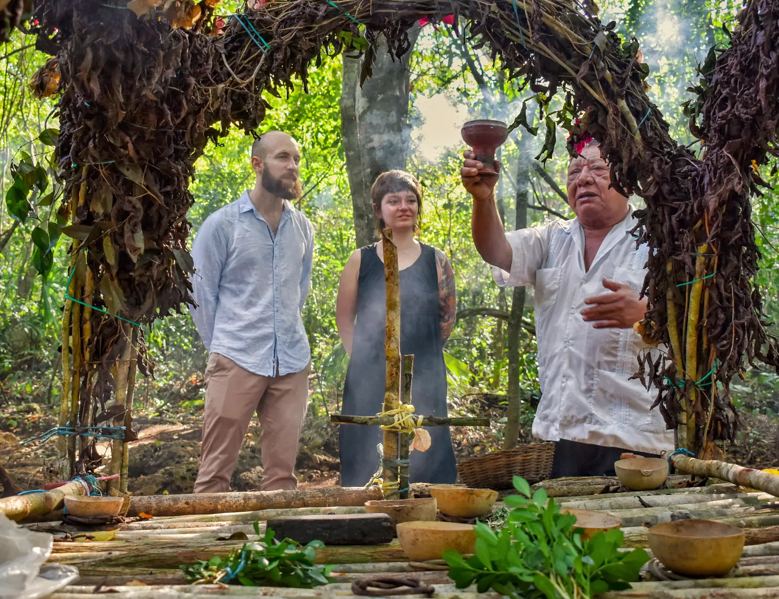 Visitors taking part in a Maya cleansing ceremony