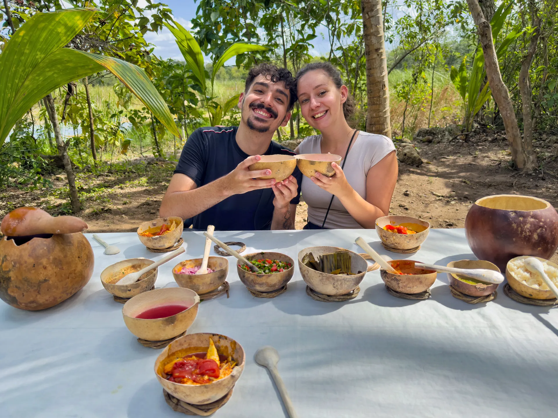 Visitors sharing a meal during the Maya cooking experience