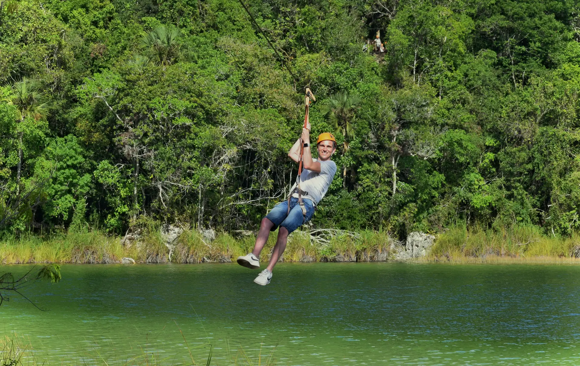 Zip line over the lagoon at Punta Laguna